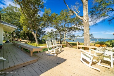This stunning soundfront home in Pine Knoll Shores has been on The Country Club of the Crystal Coast in North Carolina - for sale on GolfHomes.com, golf home, golf lot