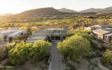 As you enter, you're greeted by soaring ceilings and walls of on Desert Mountain Golf Club - Renegade Course in Arizona - for sale on GolfHomes.com, golf home, golf lot
