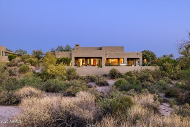 As you enter, you're greeted by soaring ceilings and walls of on Desert Mountain Golf Club - Renegade Course in Arizona - for sale on GolfHomes.com, golf home, golf lot