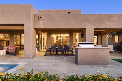 As you enter, you're greeted by soaring ceilings and walls of on Desert Mountain Golf Club - Renegade Course in Arizona - for sale on GolfHomes.com, golf home, golf lot
