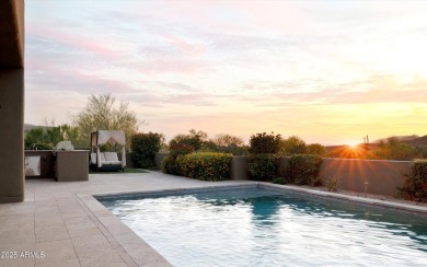 As you enter, you're greeted by soaring ceilings and walls of on Desert Mountain Golf Club - Renegade Course in Arizona - for sale on GolfHomes.com, golf home, golf lot