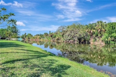 Enjoy a peaceful lake view from your glass enclosed lanai.  This on LaPlaya Golf Club in Florida - for sale on GolfHomes.com, golf home, golf lot