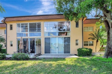 Enjoy a peaceful lake view from your glass enclosed lanai.  This on LaPlaya Golf Club in Florida - for sale on GolfHomes.com, golf home, golf lot