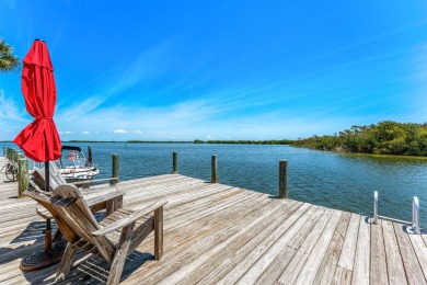 Experience the Magic of Waterfront Living at Spanish Trace on Cocoa Beach Country Club in Florida - for sale on GolfHomes.com, golf home, golf lot