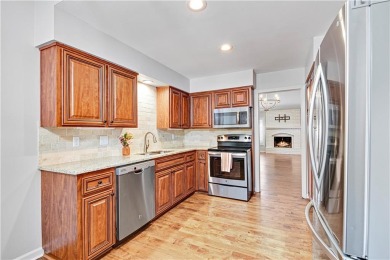 STUNNING AND SPACIOUS RANCH-STYLE TOWNHOUSE IN COVETED LEAWOOD on Leawood South Country Club in Kansas - for sale on GolfHomes.com, golf home, golf lot