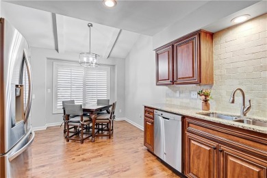 STUNNING AND SPACIOUS RANCH-STYLE TOWNHOUSE IN COVETED LEAWOOD on Leawood South Country Club in Kansas - for sale on GolfHomes.com, golf home, golf lot