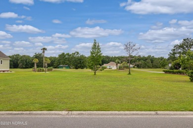 Build the custom home of your dreams on this lovely homesite in on Brunswick Plantation and Golf Resorts in North Carolina - for sale on GolfHomes.com, golf home, golf lot