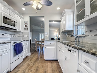 One or more photo(s) has been virtually staged. DISCOVER YOUR on Herons Glen Golf and Country Club in Florida - for sale on GolfHomes.com, golf home, golf lot