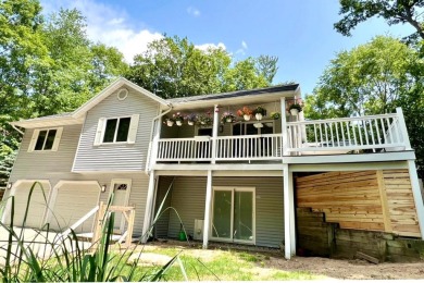 Move-in ready 3-bedroom, 2-bath ranch in the peaceful hills of on Canadian Lakes Country Club-The Highlands Course in Michigan - for sale on GolfHomes.com, golf home, golf lot