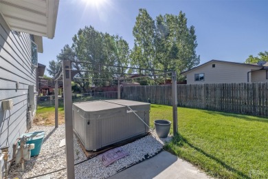 Welcome home to this charming 3 bedroom, 2 bathroom multi-level on Bill Roberts Municipal Golf Course in Montana - for sale on GolfHomes.com, golf home, golf lot