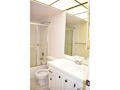 Here is a great value for a large 2/2 on the ground floor next on Sunrise Lakes Phase III in Florida - for sale on GolfHomes.com, golf home, golf lot