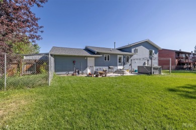 Welcome home to this charming 3 bedroom, 2 bathroom multi-level on Bill Roberts Municipal Golf Course in Montana - for sale on GolfHomes.com, golf home, golf lot