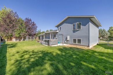 Welcome home to this charming 3 bedroom, 2 bathroom multi-level on Bill Roberts Municipal Golf Course in Montana - for sale on GolfHomes.com, golf home, golf lot