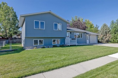 Welcome home to this charming 3 bedroom, 2 bathroom multi-level on Bill Roberts Municipal Golf Course in Montana - for sale on GolfHomes.com, golf home, golf lot