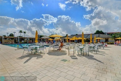 DRAMATICALY REDUCED, MOTIVATED SELLER, Step into this on Wynmoor Golf Course in Florida - for sale on GolfHomes.com, golf home, golf lot