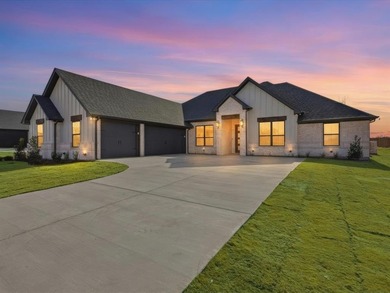 Welcome home to a stunning Ryco Homes brand-new build located in on Pecan Plantation Country Club in Texas - for sale on GolfHomes.com, golf home, golf lot