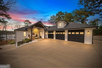 Welcome to this stunning lakefront home in the gated community on The Golf Club at Cuscowilla in Georgia - for sale on GolfHomes.com, golf home, golf lot