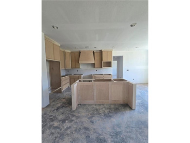Take a look at this one-level new construction home located on a on Big Sugar Golf Club in Arkansas - for sale on GolfHomes.com, golf home, golf lot
