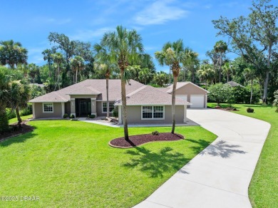 CAR COLLECTORS DREAM...This stunning, well-maintained, 3 bedroom on Halifax Plantation Golf Club in Florida - for sale on GolfHomes.com, golf home, golf lot