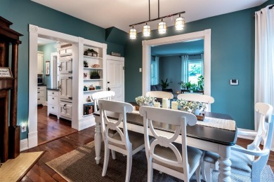 Step into timeless charm with this stunning Folk Victorian home on Harmon Golf Club in Ohio - for sale on GolfHomes.com, golf home, golf lot