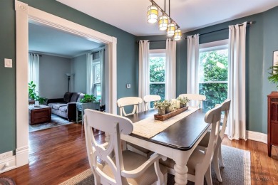 Step into timeless charm with this stunning Folk Victorian home on Harmon Golf Club in Ohio - for sale on GolfHomes.com, golf home, golf lot