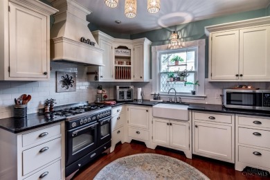 Step into timeless charm with this stunning Folk Victorian home on Harmon Golf Club in Ohio - for sale on GolfHomes.com, golf home, golf lot
