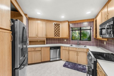 Spacious 3 bed, 3 bath residence in the desirable Caravelle on Boca Pointe Country Club in Florida - for sale on GolfHomes.com, golf home, golf lot