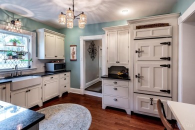 Step into timeless charm with this stunning Folk Victorian home on Harmon Golf Club in Ohio - for sale on GolfHomes.com, golf home, golf lot
