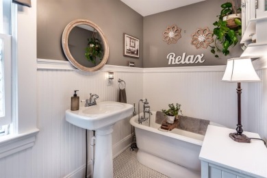 Step into timeless charm with this stunning Folk Victorian home on Harmon Golf Club in Ohio - for sale on GolfHomes.com, golf home, golf lot