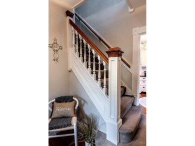 Step into timeless charm with this stunning Folk Victorian home on Harmon Golf Club in Ohio - for sale on GolfHomes.com, golf home, golf lot