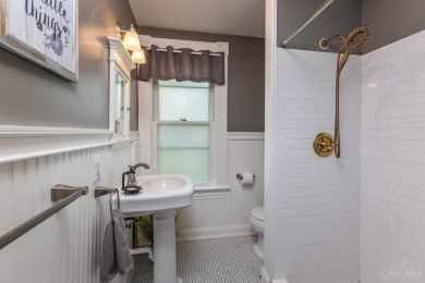 Step into timeless charm with this stunning Folk Victorian home on Harmon Golf Club in Ohio - for sale on GolfHomes.com, golf home, golf lot