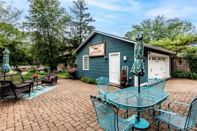Step into timeless charm with this stunning Folk Victorian home on Harmon Golf Club in Ohio - for sale on GolfHomes.com, golf home, golf lot