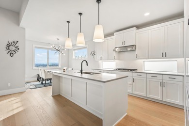 Gracefully situated on a quiet, private lane is this amazing on Rivers Edge Golf Resort in Oregon - for sale on GolfHomes.com, golf home, golf lot