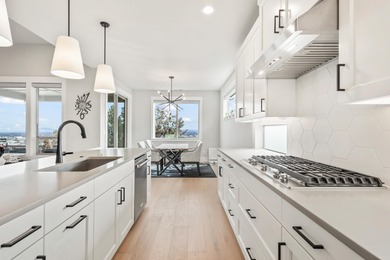 Gracefully situated on a quiet, private lane is this amazing on Rivers Edge Golf Resort in Oregon - for sale on GolfHomes.com, golf home, golf lot