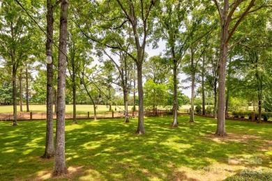 This exquisite brick residence located in Providence Country on Providence Country Club in North Carolina - for sale on GolfHomes.com, golf home, golf lot