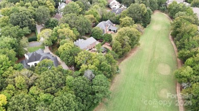 This exquisite brick residence located in Providence Country on Providence Country Club in North Carolina - for sale on GolfHomes.com, golf home, golf lot