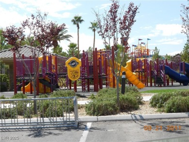 A very popular community with resort-style palm trees, Public on Rhodes Ranch Golf Club in Nevada - for sale on GolfHomes.com, golf home, golf lot