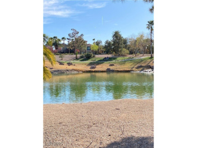 A very popular community with resort-style palm trees, Public on Rhodes Ranch Golf Club in Nevada - for sale on GolfHomes.com, golf home, golf lot