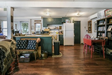 Klinger Lake Cottage-Enjoy beautiful sunsets and 50 feet of on Klinger Lake Country Club in Michigan - for sale on GolfHomes.com, golf home, golf lot