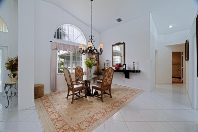 This stunning residence features 3 spacious bedrooms and 3 full on Westchester Golf and Country Club in Florida - for sale on GolfHomes.com, golf home, golf lot