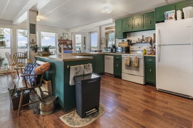 Klinger Lake Cottage-Enjoy beautiful sunsets and 50 feet of on Klinger Lake Country Club in Michigan - for sale on GolfHomes.com, golf home, golf lot