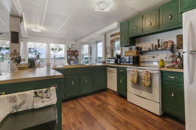 Klinger Lake Cottage-Enjoy beautiful sunsets and 50 feet of on Klinger Lake Country Club in Michigan - for sale on GolfHomes.com, golf home, golf lot