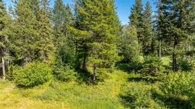 Perfect setting overlooking the elevated 4th green of Meadow on Meadow Lake Golf Resort in Montana - for sale on GolfHomes.com, golf home, golf lot