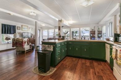 Klinger Lake Cottage-Enjoy beautiful sunsets and 50 feet of on Klinger Lake Country Club in Michigan - for sale on GolfHomes.com, golf home, golf lot