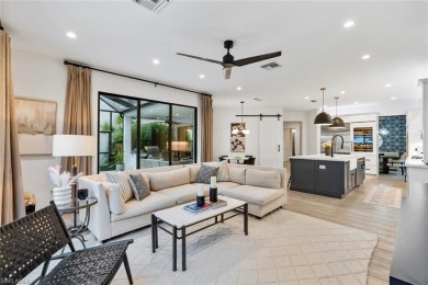 Welcome to your dream home--an elegant and functional retreat on Quail West Golf and Country Club in Florida - for sale on GolfHomes.com, golf home, golf lot