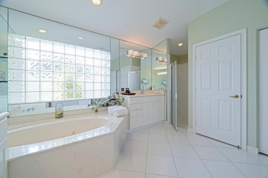 This stunning residence features 3 spacious bedrooms and 3 full on Westchester Golf and Country Club in Florida - for sale on GolfHomes.com, golf home, golf lot
