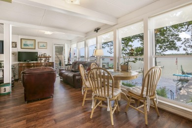 Klinger Lake Cottage-Enjoy beautiful sunsets and 50 feet of on Klinger Lake Country Club in Michigan - for sale on GolfHomes.com, golf home, golf lot
