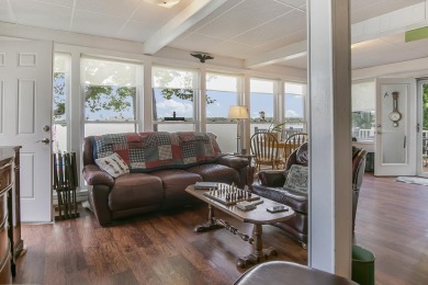 Klinger Lake Cottage-Enjoy beautiful sunsets and 50 feet of on Klinger Lake Country Club in Michigan - for sale on GolfHomes.com, golf home, golf lot