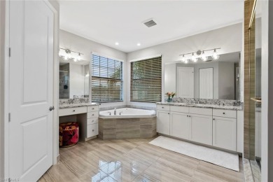 Welcome to your dream home--an elegant and functional retreat on Quail West Golf and Country Club in Florida - for sale on GolfHomes.com, golf home, golf lot