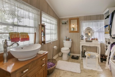 Klinger Lake Cottage-Enjoy beautiful sunsets and 50 feet of on Klinger Lake Country Club in Michigan - for sale on GolfHomes.com, golf home, golf lot